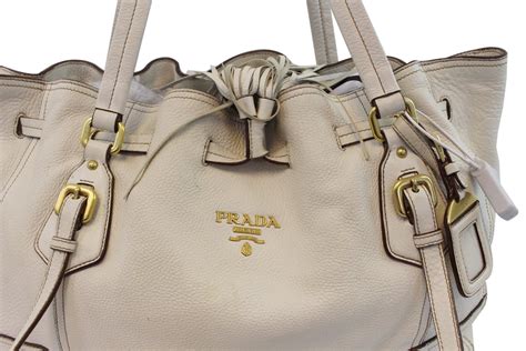 prada milano bag very stiff leather with all leathe handles|Prada fashion handbags.